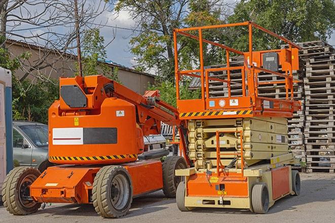 forklift carrying pallets in a warehouse in Belleair Bluffs